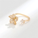 Anillo de flor giratoria