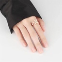 Anillo de flor giratoria