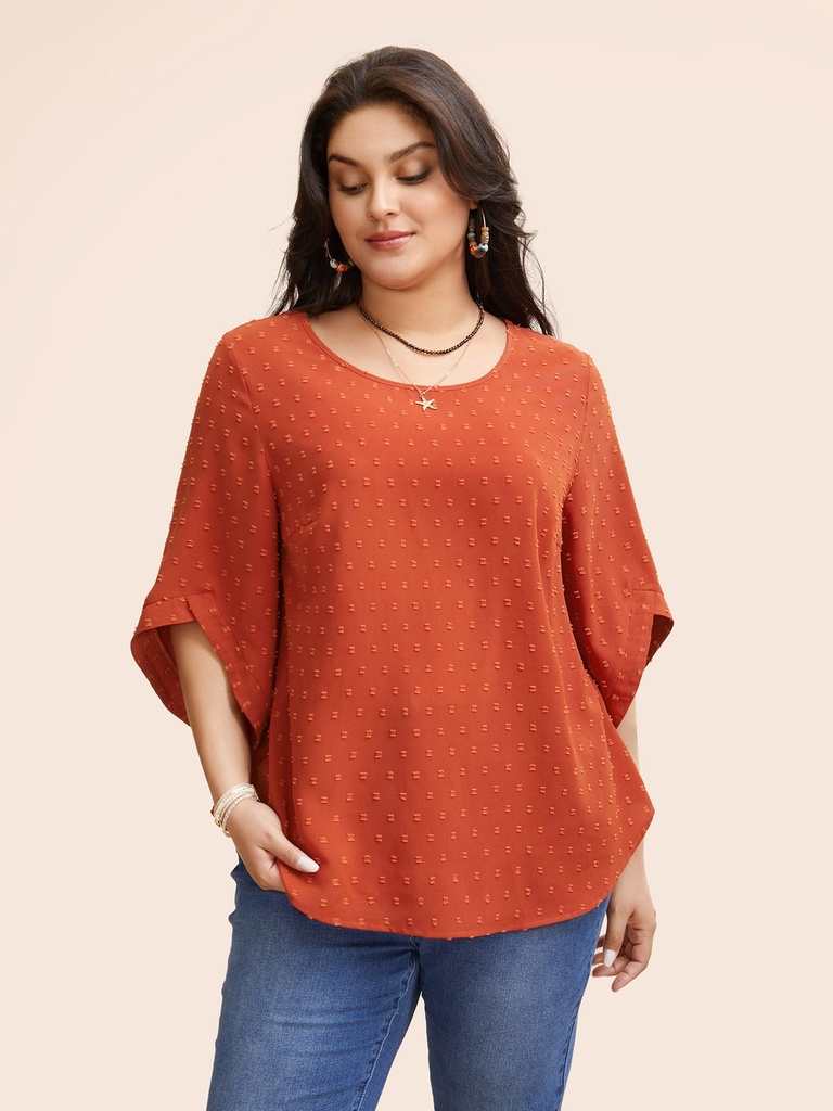 Blusa texturizada de cuello redondo