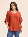 Blusa texturizada de cuello redondo