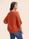 Blusa texturizada de cuello redondo