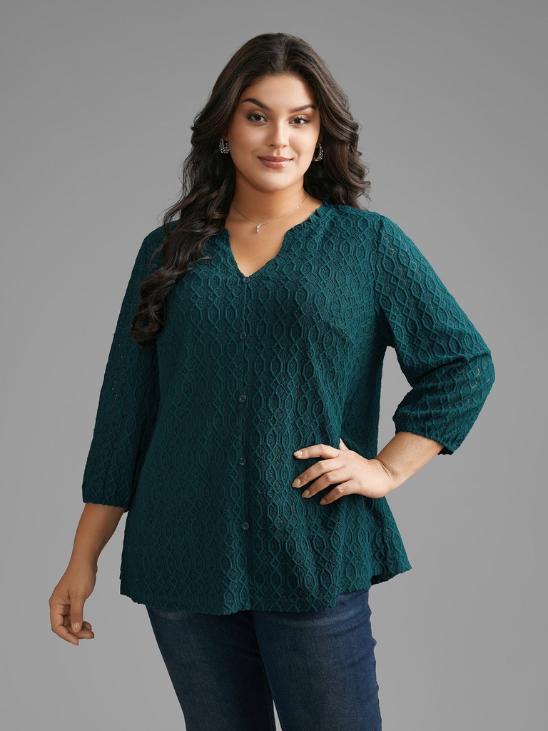Blusa jersey con botones texturizados
