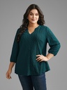 Blusa jersey con botones texturizados