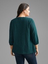 Blusa jersey con botones texturizados