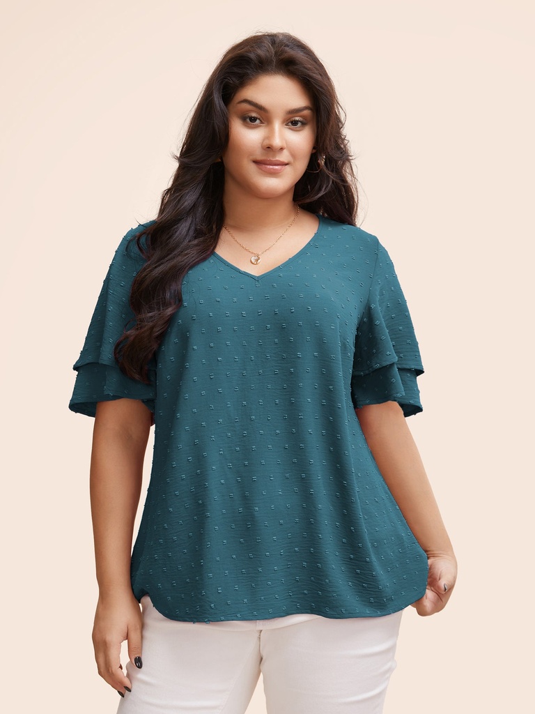 Blusa de lunares con escote en V