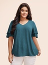 Blusa de lunares con escote en V