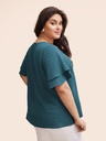 Blusa de lunares con escote en V