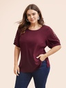 Blusa con mangas abiertas y perlas