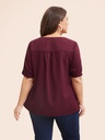 Blusa con mangas abiertas y perlas