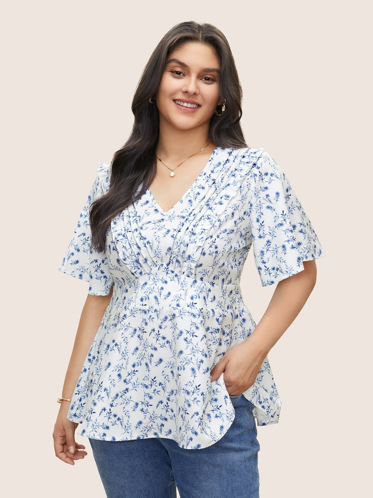 Blusa floral con mangas de volantes