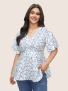 Blusa floral con mangas de volantes