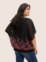Blusa con mangas de murciélago floral