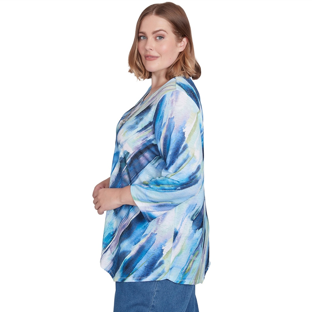 Blusa bordada con flores bohemias