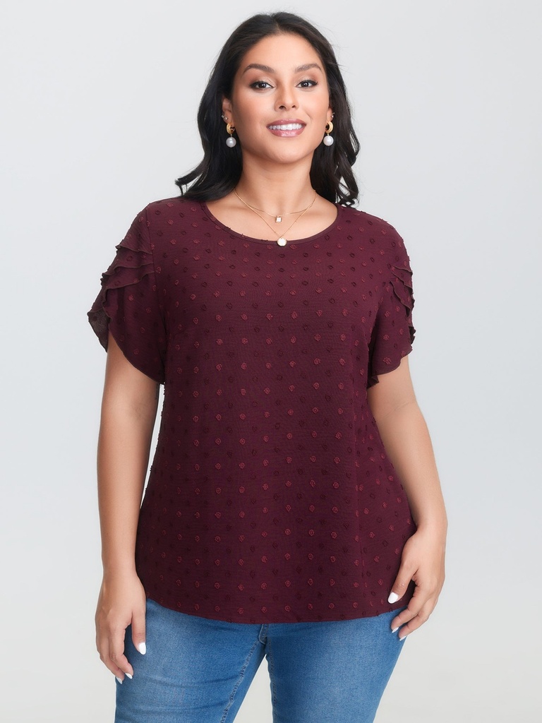Blusa con volantes escalonados