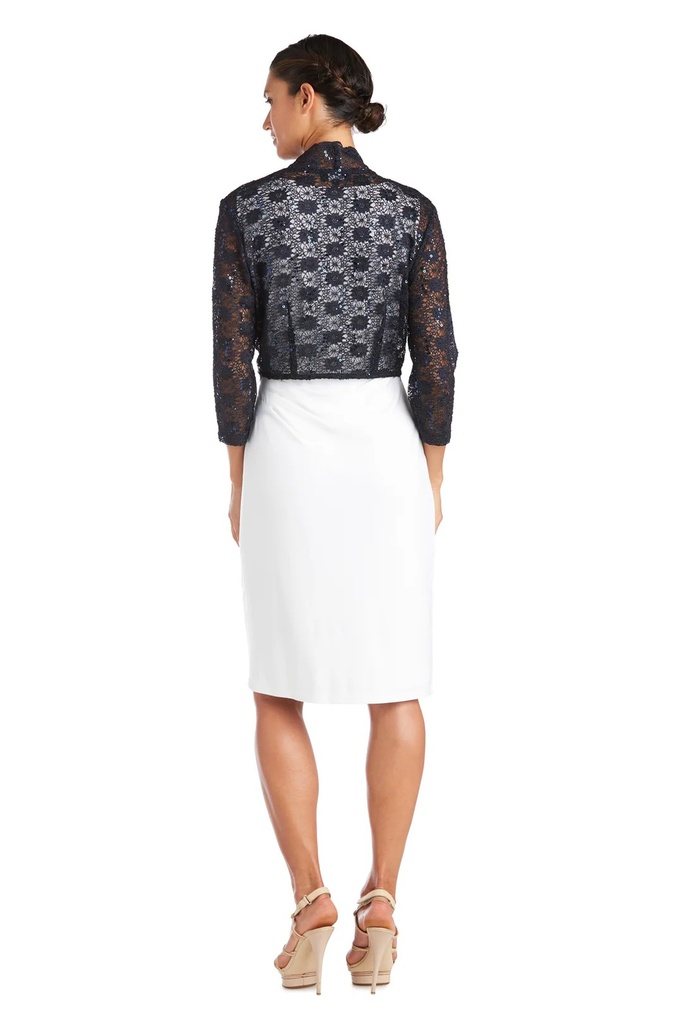 Bolero de encaje con bordes festoneados