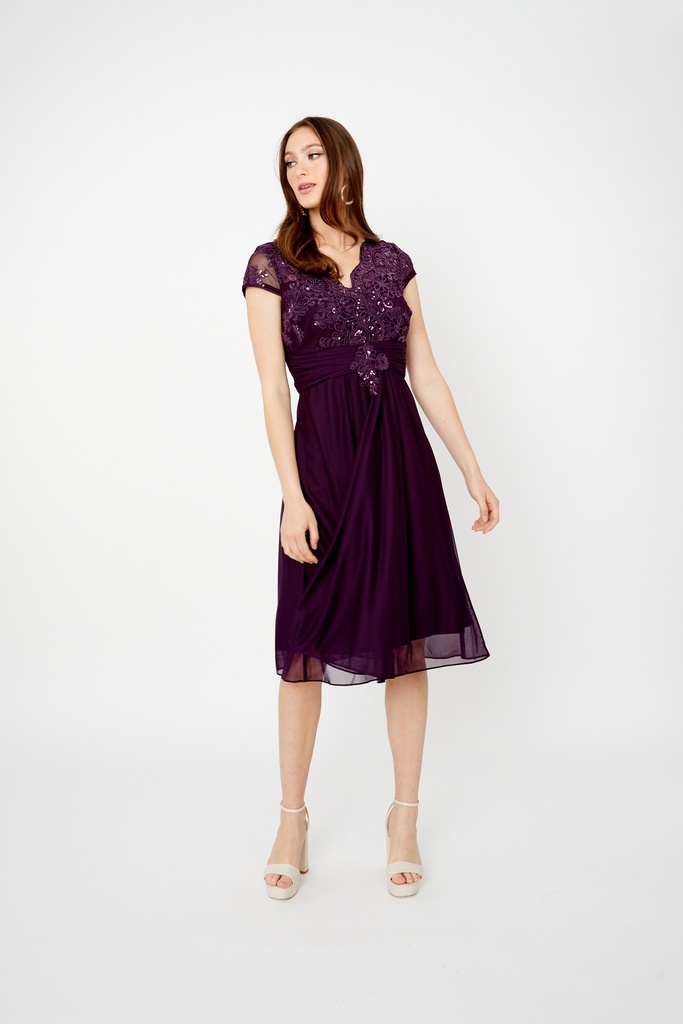 Vestido drapeado con cascada