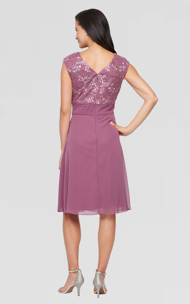 Vestido drapeado con cascada