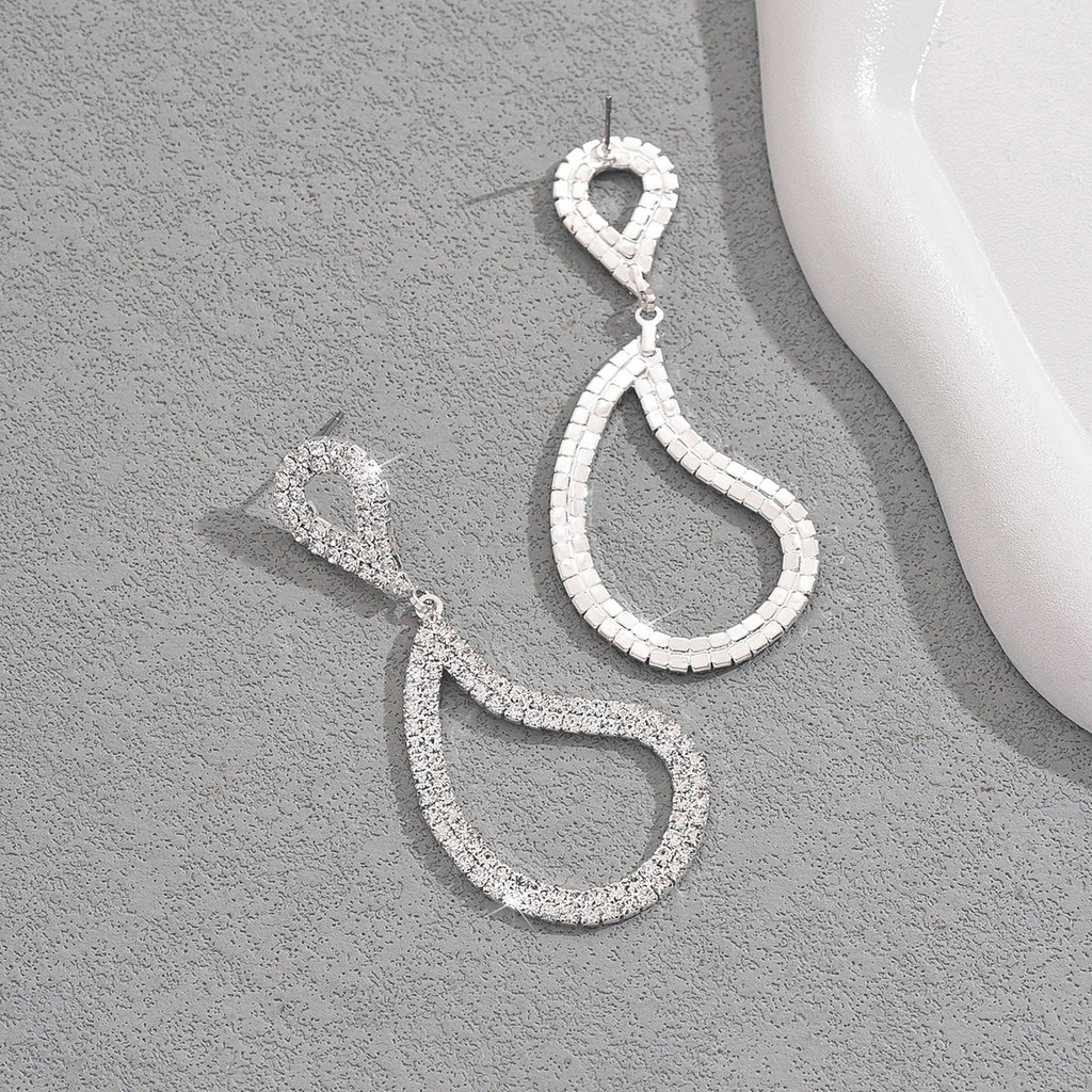 Aretes colgantes con diamantes