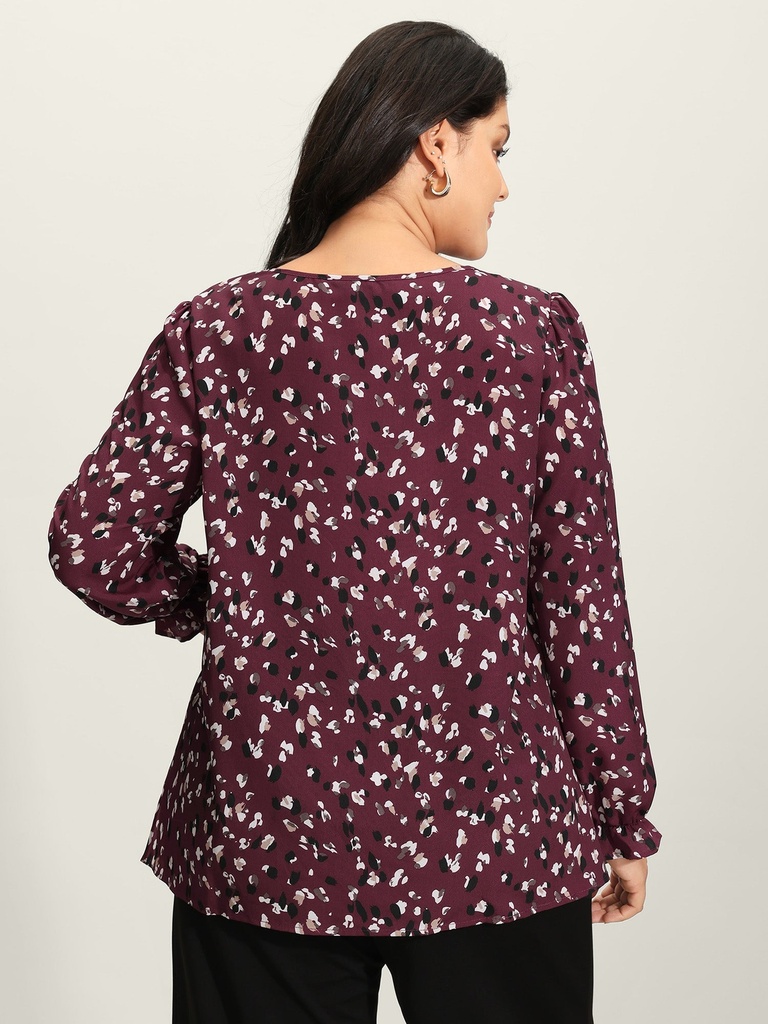 Blusa floral con mangas abullonadas