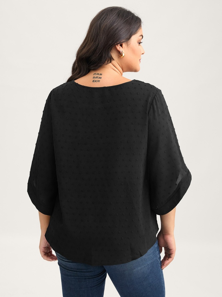 Blusa texturizada de cuello redondo