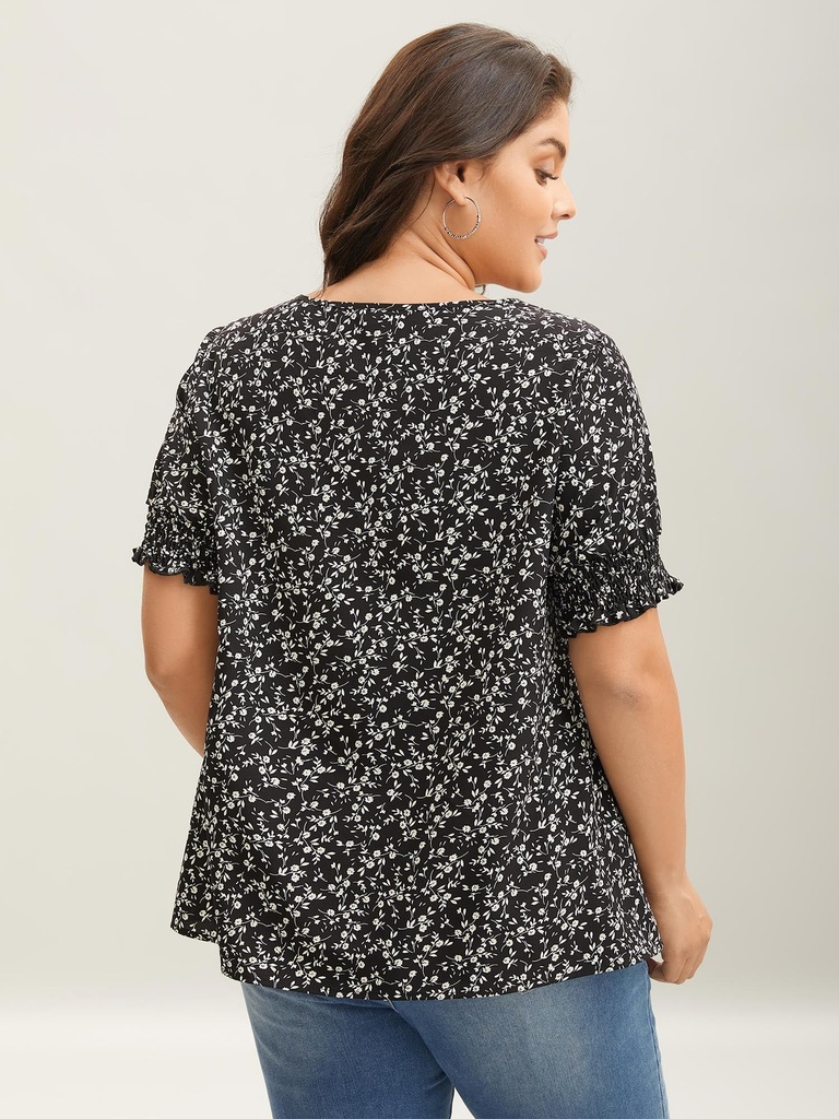 Blusa floral con escote elástico