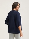 Blusa con cuello asimétrico