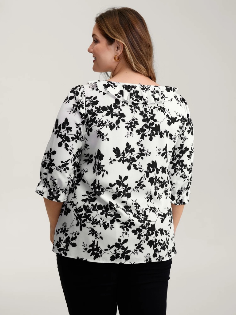 Blusa floral con detalles plisados