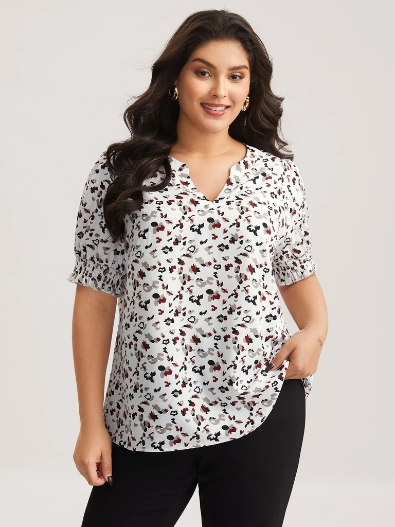 Blusa con cuello en V de lunares