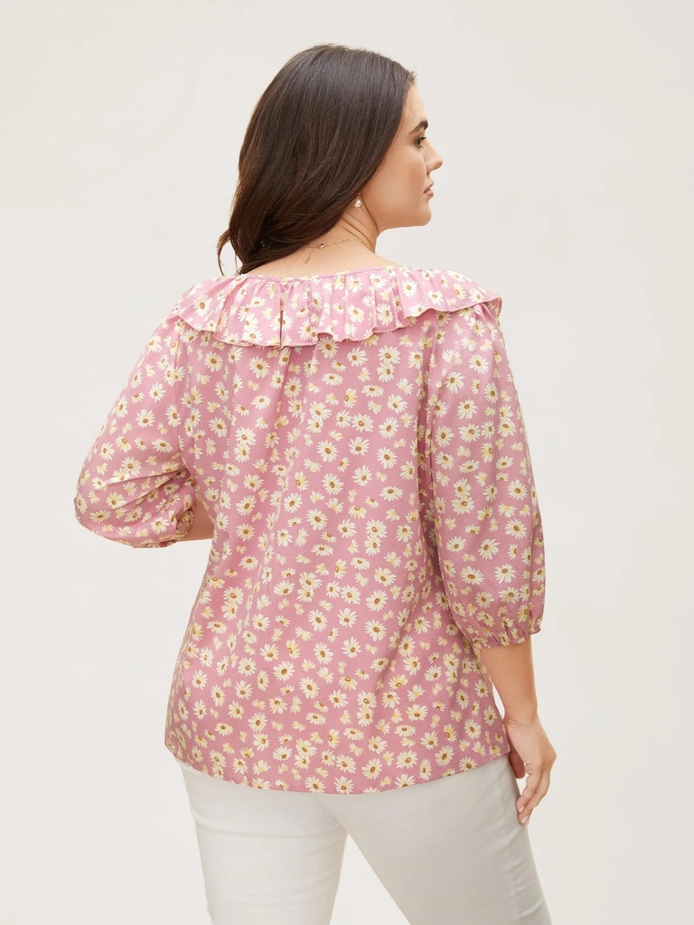 Blusa floral con detalles plisados
