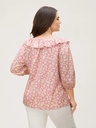 Blusa floral con detalles plisados