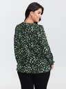 Blusa con volantes en el escote