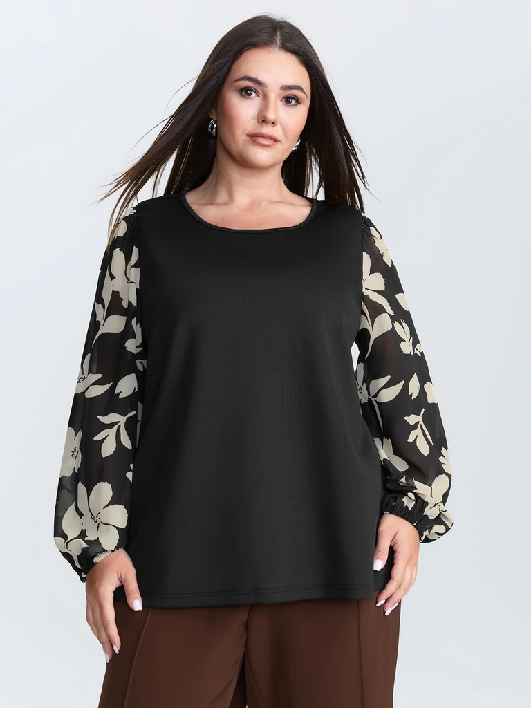 Blusa con volantes en el escote