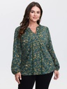 Blusa con volantes en el escote