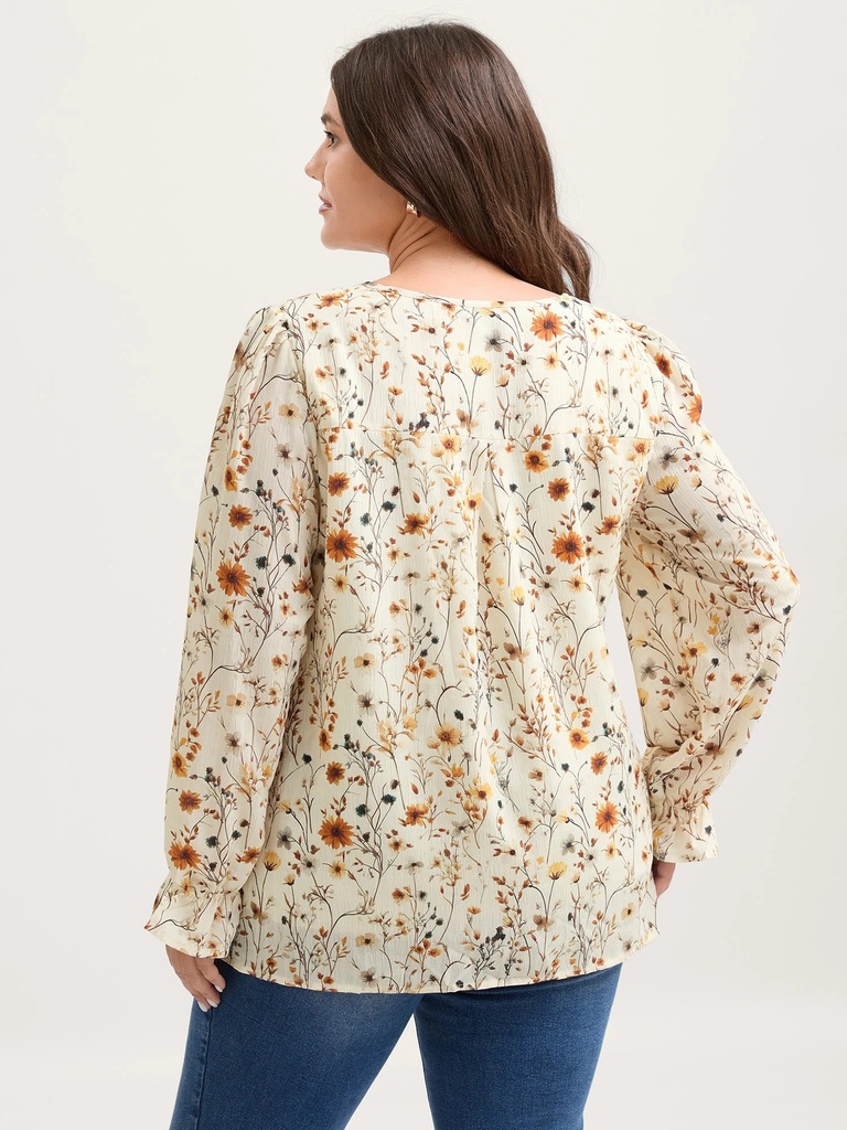 Blusa con volantes en el escote