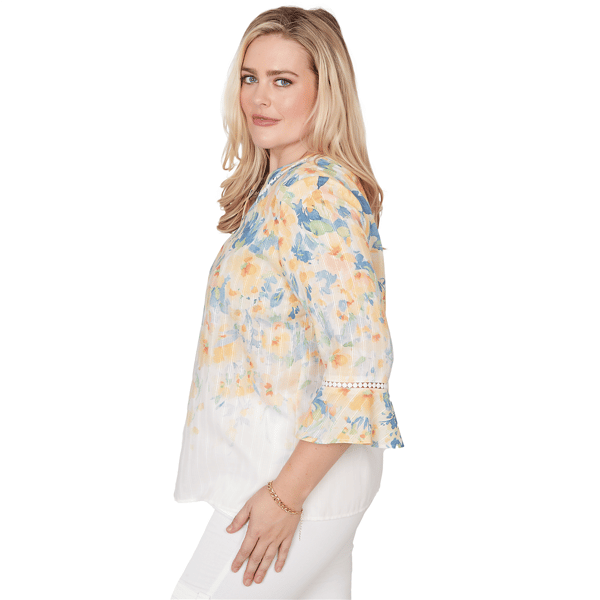 Blusa floral de manga con volantes