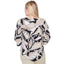 Blusa hojas y bajo puntiagudo