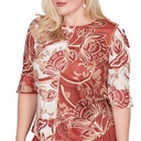 Blusa con estampado de volutas