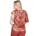 Blusa con estampado de volutas