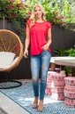 Blusa con volantes en capas coral