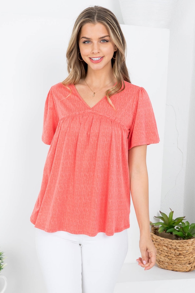 Blusa plisada con manga corta