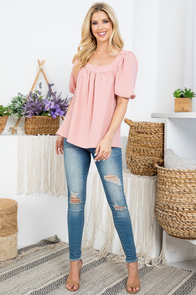 Blusa con escote cuadrado