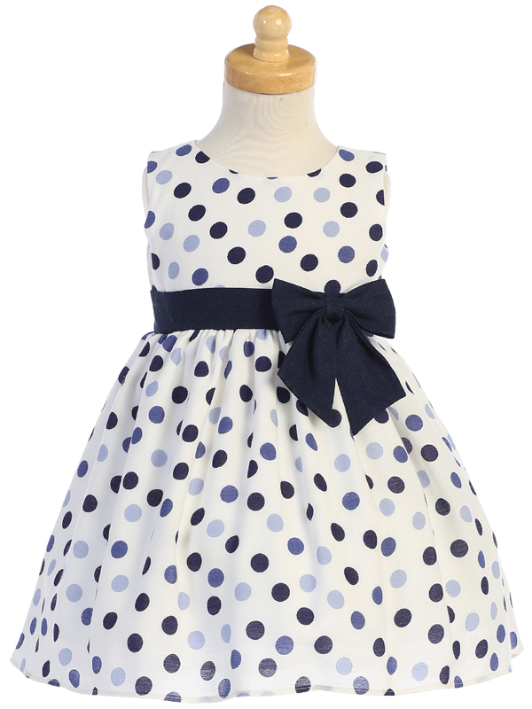 Vestido de lunares con moño