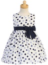 Vestido de lunares con moño