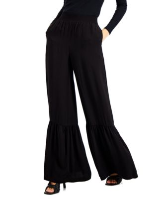 Pantalones con dobladillo escalonado