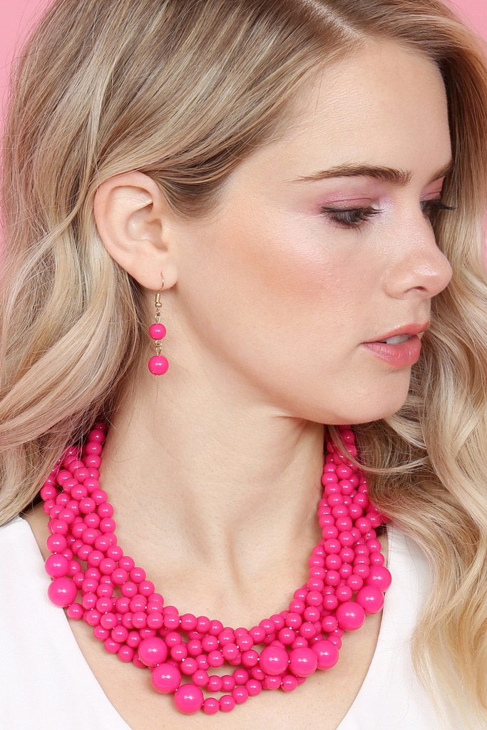 Juego de aretes y collar de pedrería