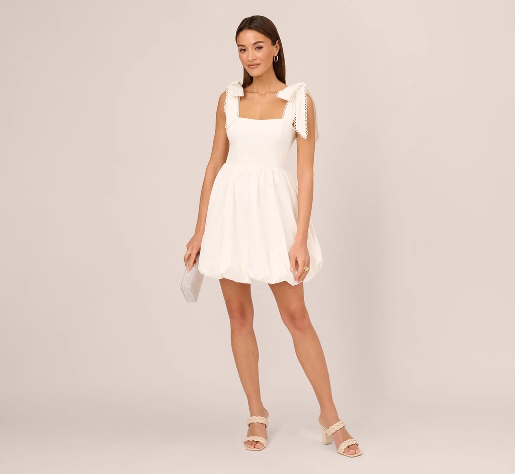 Vestido de burbuja con tirantes de lazo