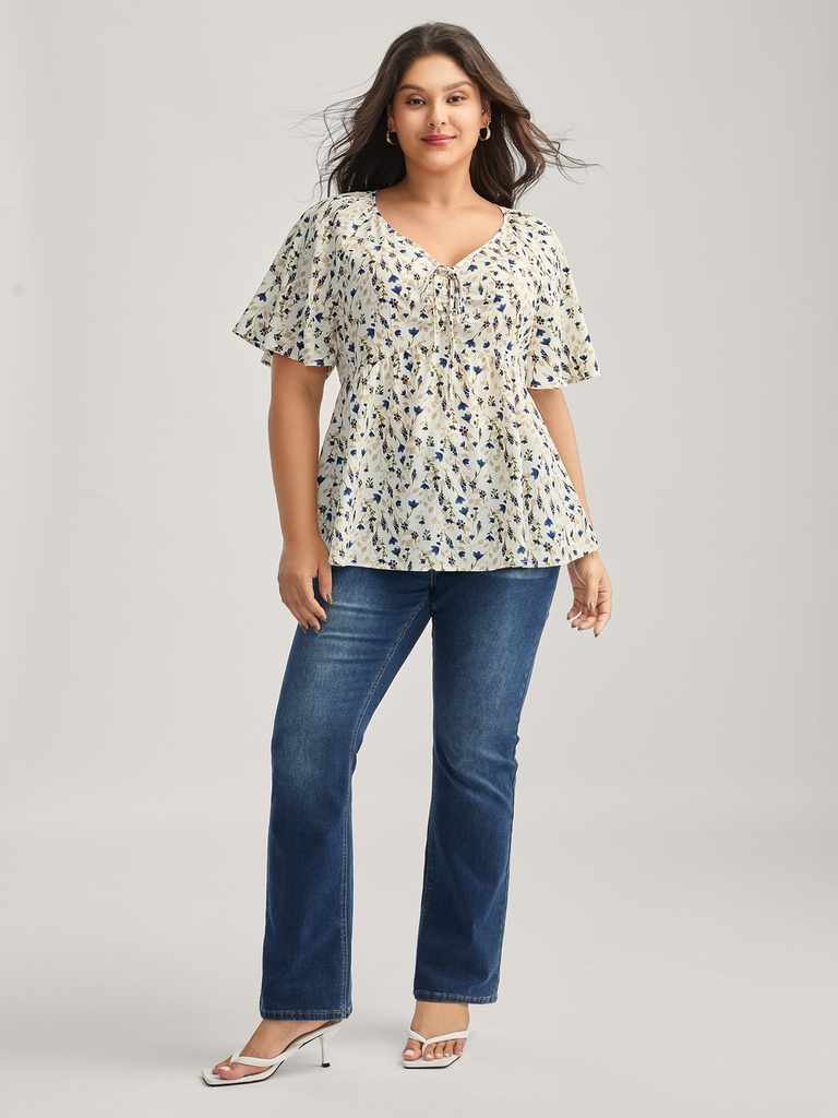 Blusa floral con fruncido delantero