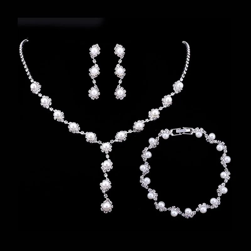 Juego de collar con aretes y pulsera de perlas