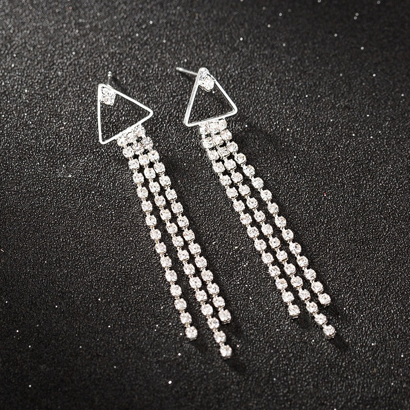 Aretes colgantes de diamantes