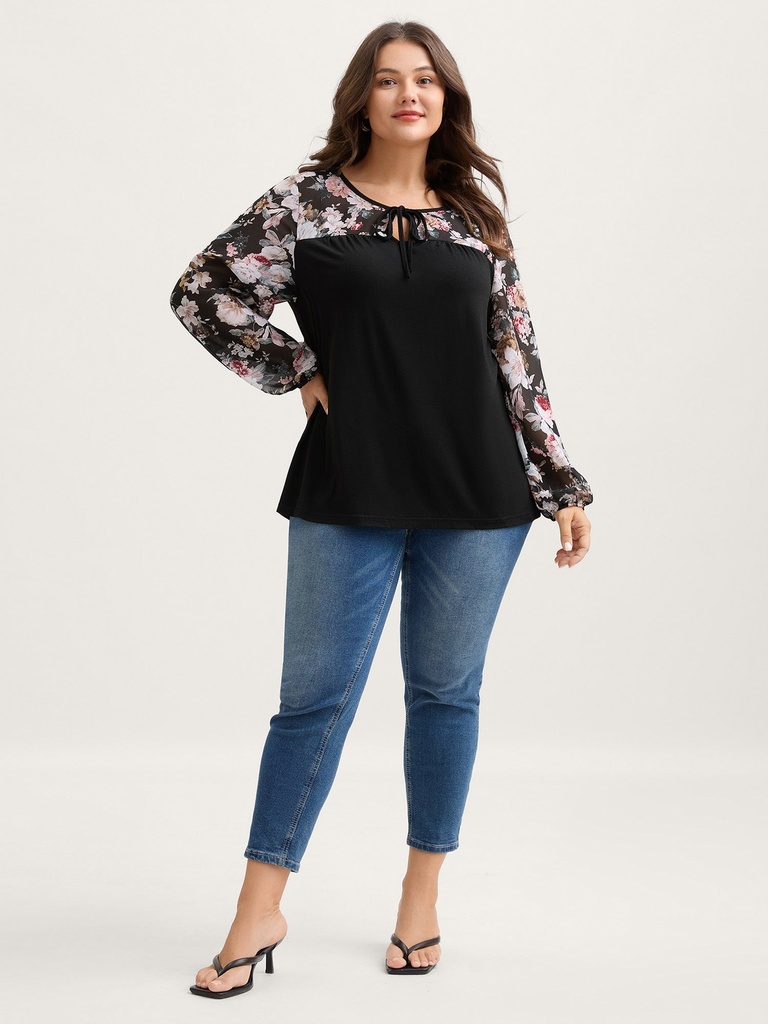 Blusa con mangas de gasa floral